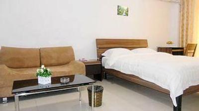 фото отеля Hongma Apartment