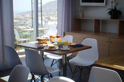 фото отеля Loizos Apartments City Center Fira