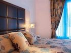 фото отеля Loizos Apartments City Center Fira