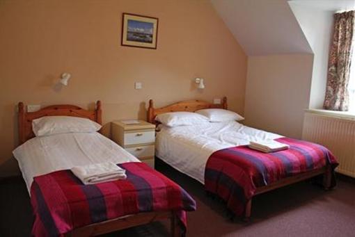 фото отеля Fairburn Lodge Muir of Ord