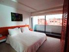 фото отеля Travelers Suites Obelisco Apartamentos Bogota