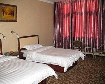 фото отеля Jiujiu Business Hotel