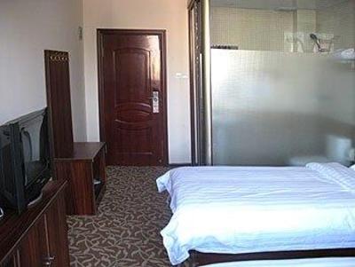 фото отеля Jiujiu Business Hotel