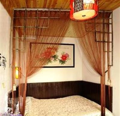 фото отеля Mengtian Xiaozhu Hostel Lijiang