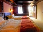 фото отеля Mengtian Xiaozhu Hostel Lijiang