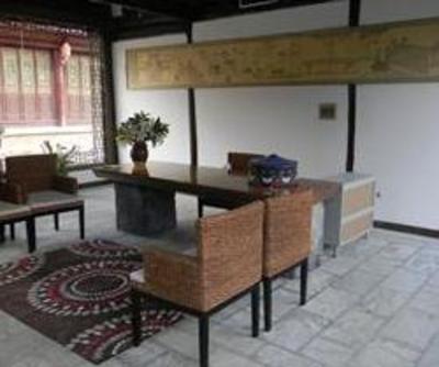 фото отеля Lijiang Gallery of Blessings Hotel