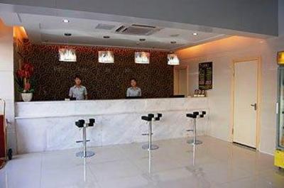фото отеля Xiamen Qingnian Yangguang Hotel Wenzaodian