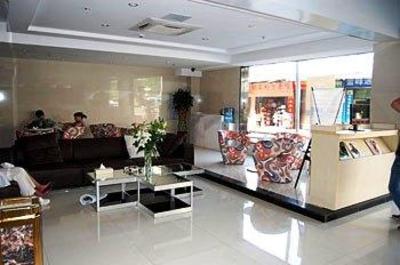 фото отеля Xiamen Qingnian Yangguang Hotel Wenzaodian