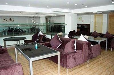фото отеля Xiamen Qingnian Yangguang Hotel Wenzaodian