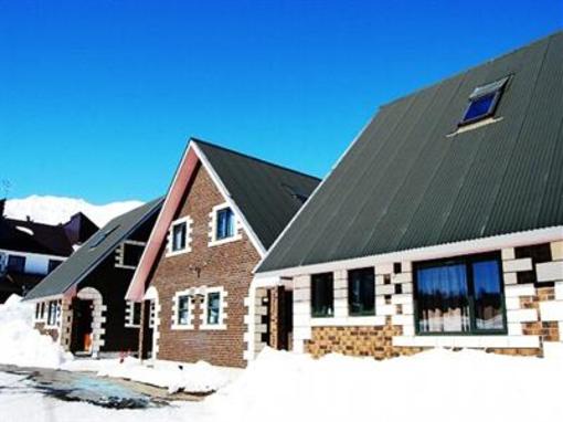 фото отеля Alpine Chalets Hakuba