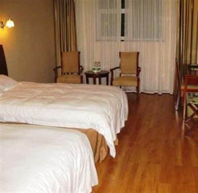 фото отеля Green Tree Inn Chain Zaozhuang Guicheng Express