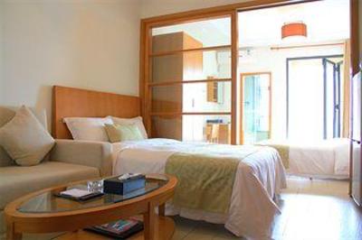 фото отеля Sanya Sweetome Vacation Rentals - Downtown