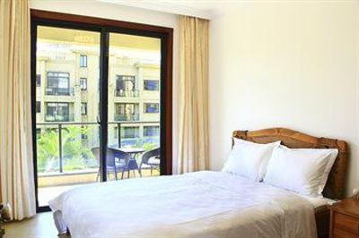 фото отеля Sanya Sweetome Vacation Rentals - Downtown