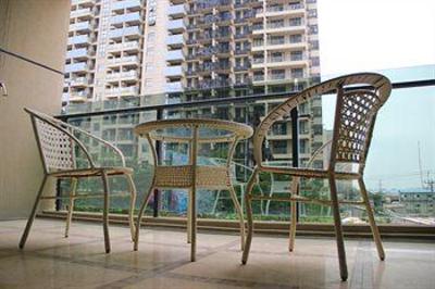 фото отеля Sanya Sweetome Vacation Rentals - Downtown