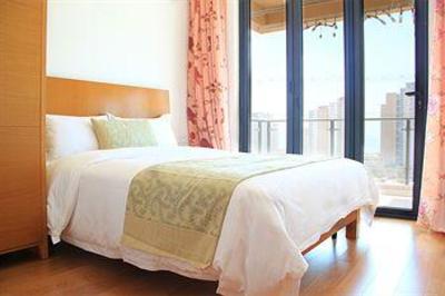 фото отеля Sanya Sweetome Vacation Rentals - Downtown