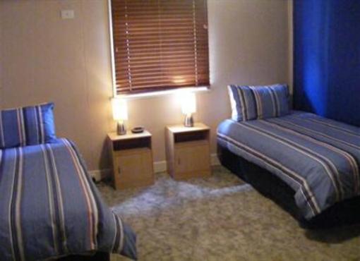 фото отеля Charles Rasp Motor Inn & Cottages