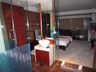 фото отеля Jinguan Impression Apartment Hotel