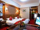 фото отеля Sunny Redbud Flower Hotel