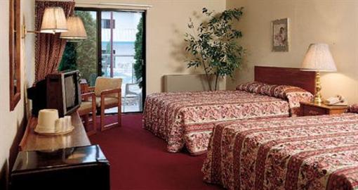 фото отеля Carousel Inn & Suites