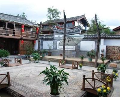 фото отеля Lijiang Baisha Holiday Resort