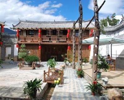 фото отеля Lijiang Baisha Holiday Resort