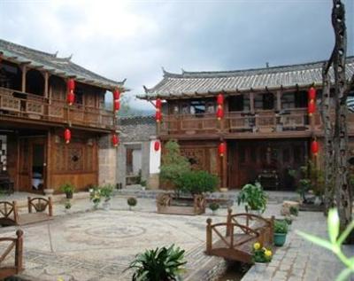 фото отеля Lijiang Baisha Holiday Resort