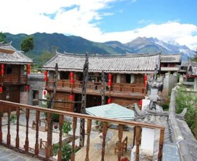 фото отеля Lijiang Baisha Holiday Resort