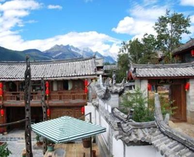 фото отеля Lijiang Baisha Holiday Resort