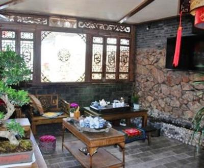 фото отеля Lijiang Baisha Holiday Resort