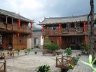 фото отеля Lijiang Baisha Holiday Resort