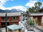 фото отеля Lijiang Baisha Holiday Resort