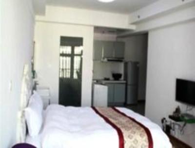 фото отеля Jinfeng Business Apartment