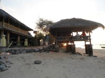 фото отеля Coral Beach Pizza Cottages