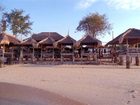 фото отеля Coral Beach Pizza Cottages