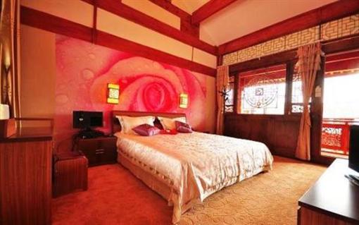 фото отеля Lijiang Doujin Inn