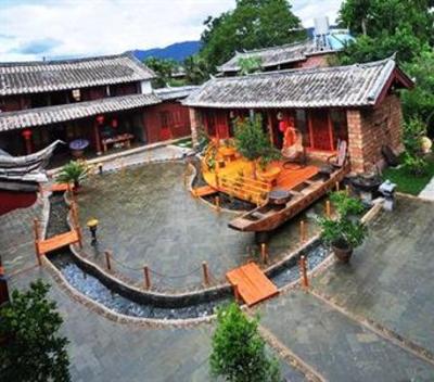 фото отеля Lijiang Doujin Inn