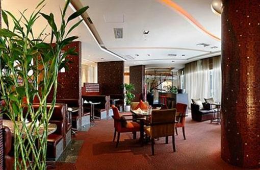 фото отеля East King Business Hotel
