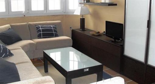 фото отеля Apartamentos Habitat Premier