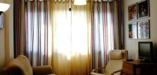 фото отеля Apartamentos Habitat Premier