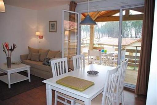 фото отеля Les Cottages Du lac Residence Parentis-en-Born