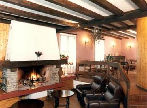 фото отеля Hotel Le Sapin Fleuri Bourg-d'Oueil