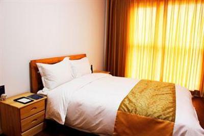 фото отеля Qingdao Tujia Vacation Rentals Golden Beach