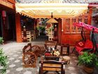 фото отеля Wangjiazhuang Inn Lijiang