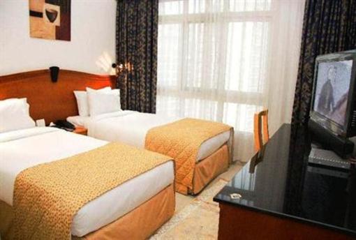 фото отеля Ramee Guestline Hotel Apartment 3