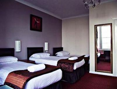 фото отеля Cosmopolitan 1 Guest House Brighton & Hove
