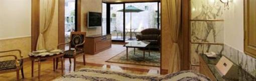 фото отеля Executive Hotel Grand Garden