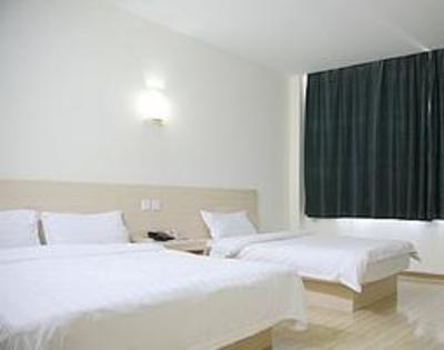 фото отеля Super 8 Hotel Qingdao Development Zone Chang Jiang Lu