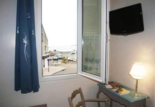 фото отеля Logis Hotel d'Arromanches Pappagall