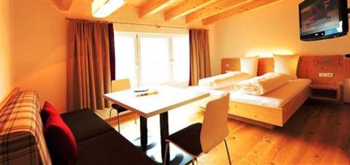 фото отеля AlpeLux Appartement an der Skipiste