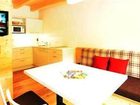 фото отеля AlpeLux Appartement an der Skipiste